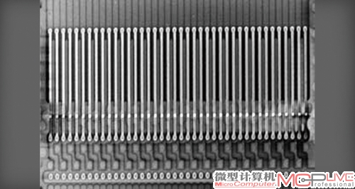 图4：IBM展示的赛道技术样品芯片的X光照片。该芯片包含了256条赛道，每条赛道直径为15～20nm。相比存储界之前也